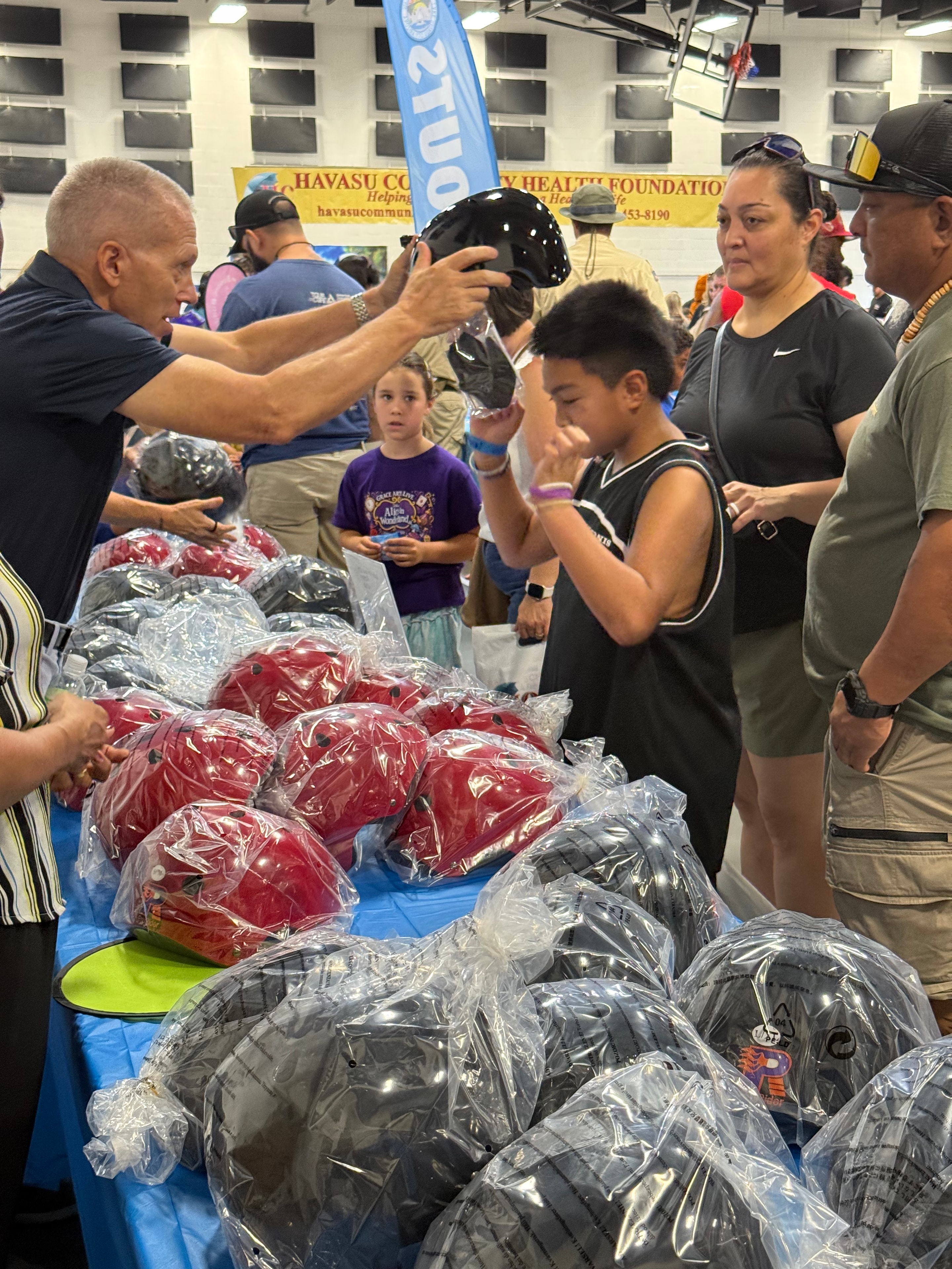 Helmet giveaway at the HCHF booth